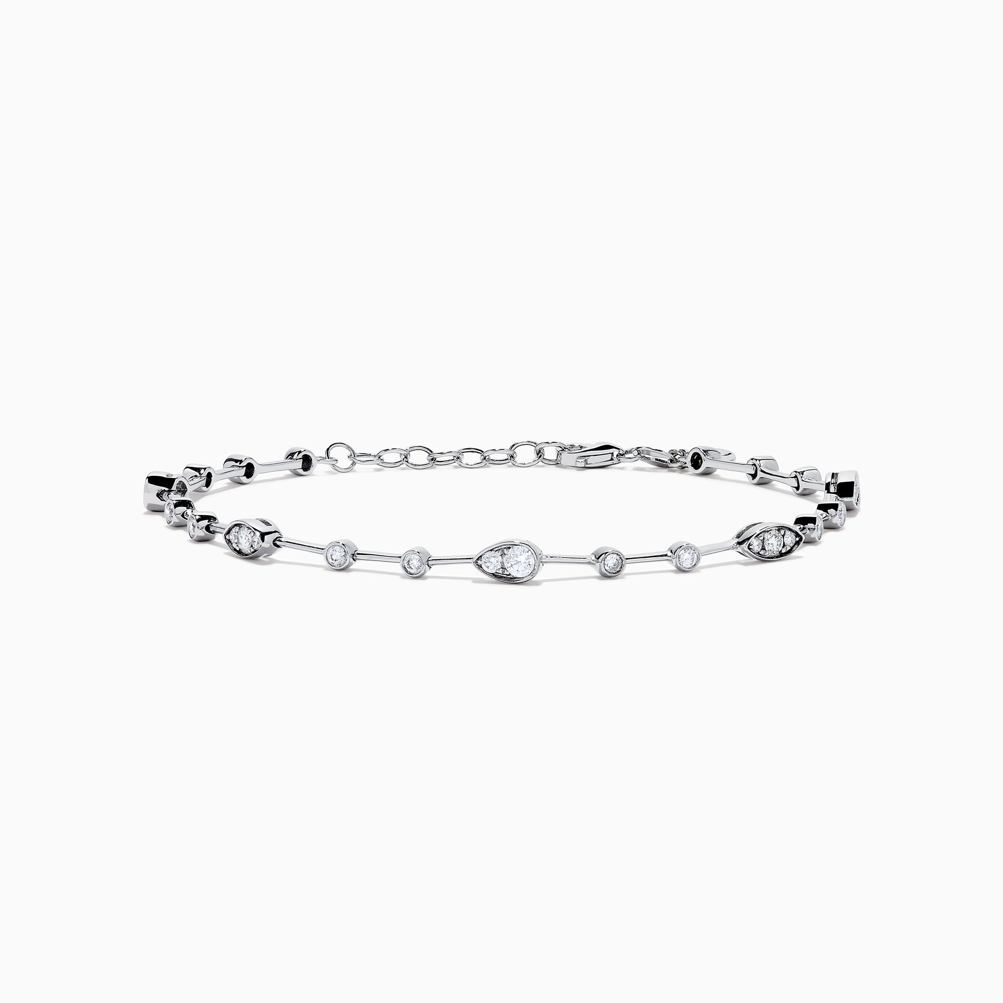 The 14K White Gold Diamond Station Bracelet features small round and teardrop-shaped diamonds spaced along a thin chain, showcased on a white background.