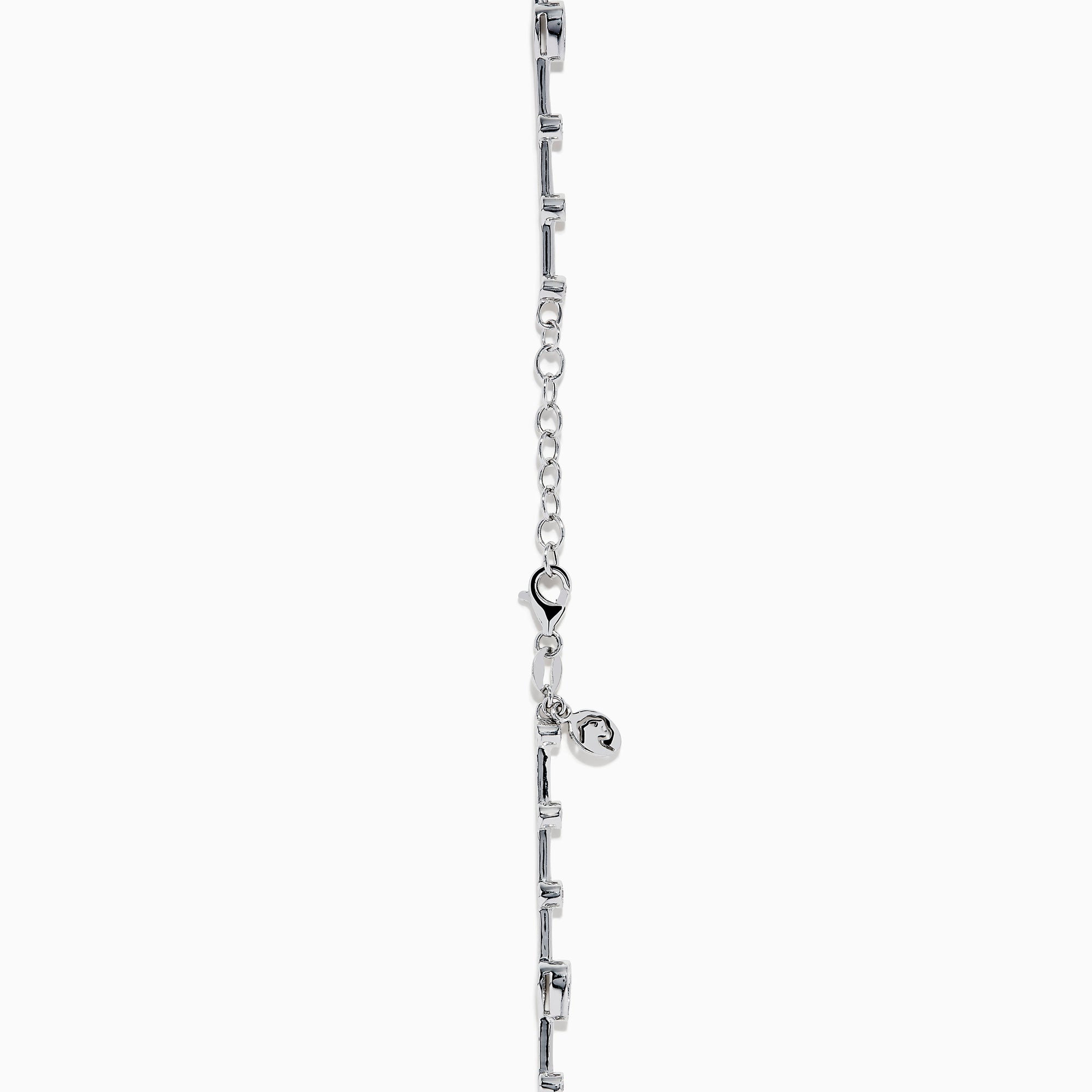 The 14K White Gold Diamond Station Bracelet features small round and teardrop-shaped diamonds spaced along a thin chain, showcased on a white background.