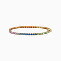 The Watercolors 14K Yellow Gold Multi Sapphire Tennis Bracelet showcases a vibrant, rainbow-gradient of sapphires set in a continuous line for a colorful and elegant look.