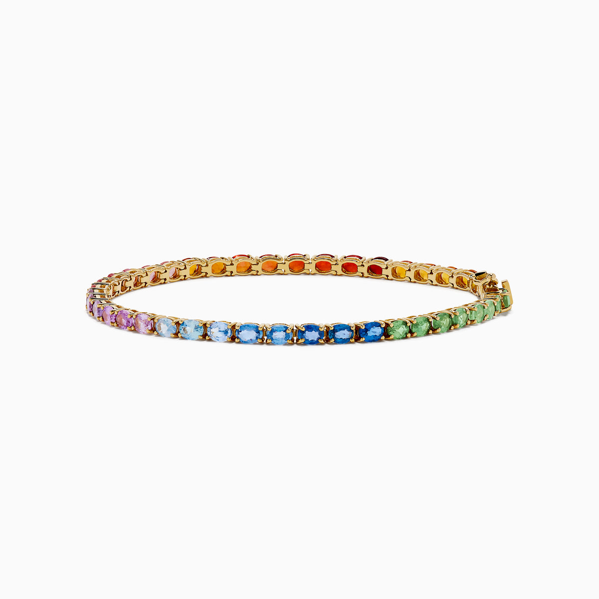 The Watercolors 14K Yellow Gold Multi Sapphire Oval Tennis Bracelet features a gradient rainbow of oval sapphires, smoothly transitioning in color from red and orange to yellow, green, blue, and purple.