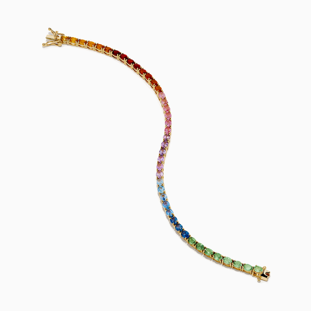 The Watercolors 14K Yellow Gold Multi Sapphire Oval Tennis Bracelet features a gradient rainbow of oval sapphires, smoothly transitioning in color from red and orange to yellow, green, blue, and purple.