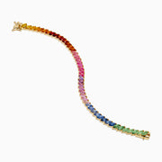 The Watercolors 14K Yellow Gold Multi Sapphire Bracelet features marquise-cut sapphires in a gradient rainbow pattern, transitioning from pink, purple, blue, green to orange around the band.