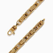 A 14K Yellow Gold Hollow Byzantine Chain-Link Bracelet, featuring an intricate and polished design, is elegantly displayed on a white background.