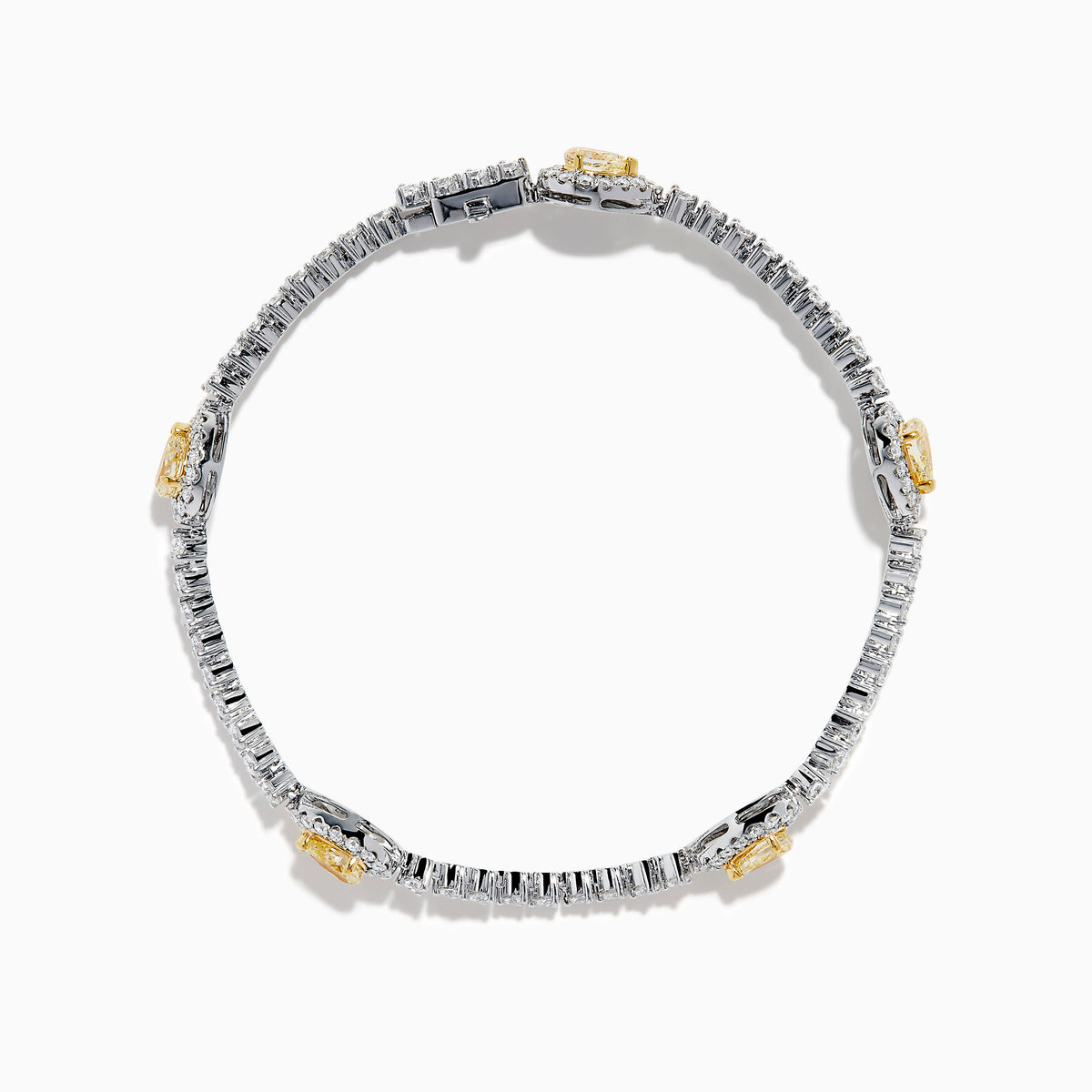 The 18K Two Tone Gold Yellow and White Diamond Station Tennis Bracelet features sparkling white diamonds and three striking yellow and white diamond stations, each outlined by smaller diamonds in an elegant, detailed design.