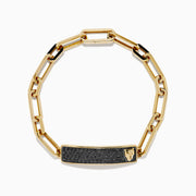 The Men's 14K Yellow Gold Black Diamond Pave Panther Link Bracelet features rectangular links and a black diamond pavé bar with a gold lion head, echoing classic panther link designs.