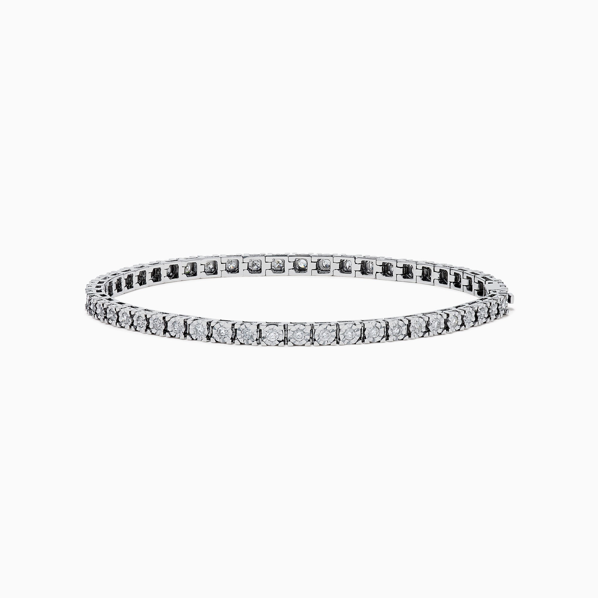 The 14K White Gold Diamond Miracle Setting 1.00ct Tennis Bracelet features a continuous row of round, sparkling white diamonds set in a slim, polished 14K white gold band and is displayed on a white background.