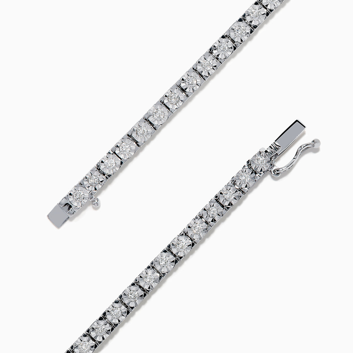 The 14K White Gold Diamond Miracle Setting 1.00ct Tennis Bracelet features a continuous row of round, sparkling white diamonds set in a slim, polished 14K white gold band and is displayed on a white background.