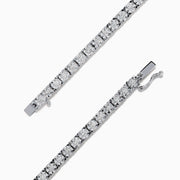The 14K White Gold Diamond Miracle Setting 1.00ct Tennis Bracelet features a continuous row of round, sparkling white diamonds set in a slim, polished 14K white gold band and is displayed on a white background.