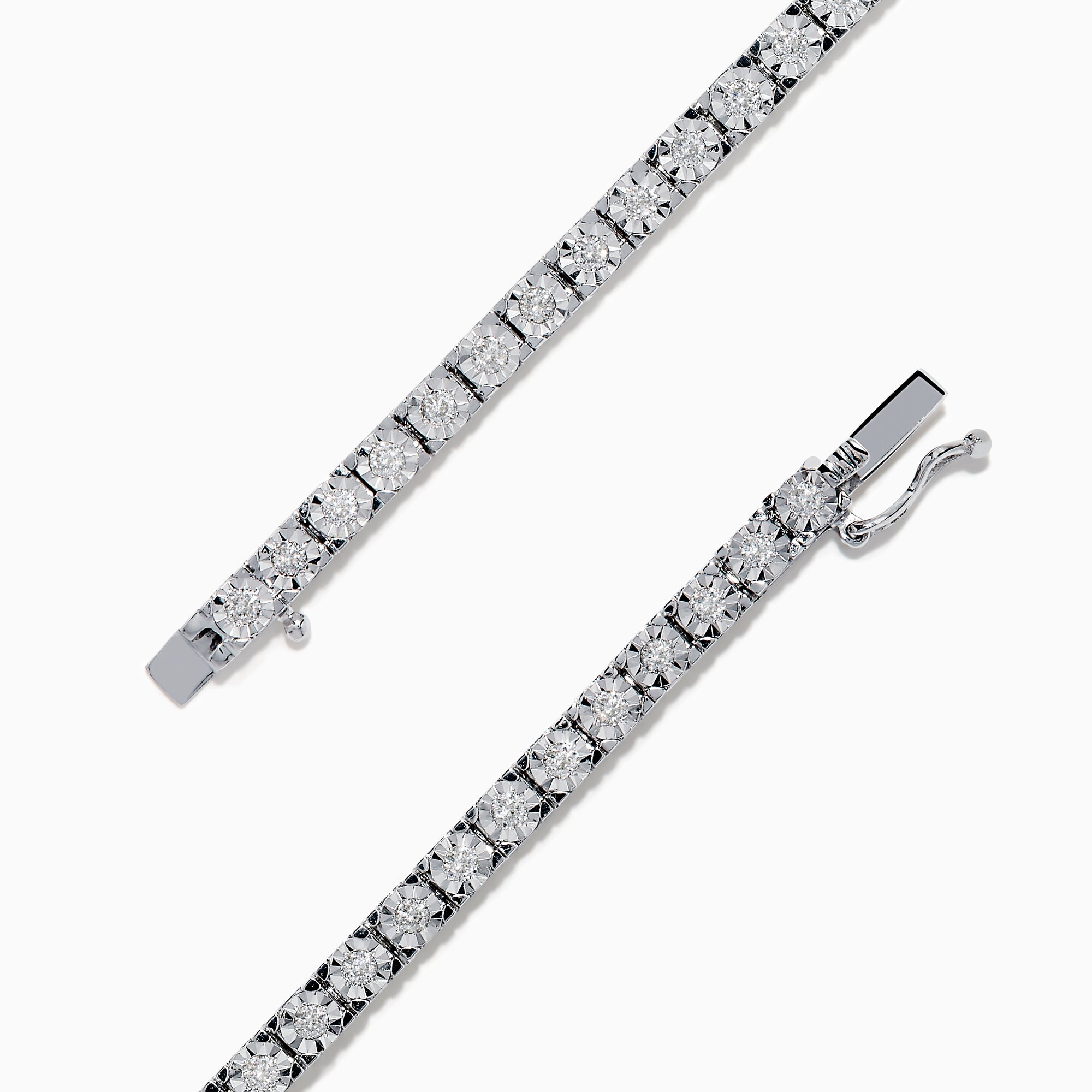 The 14K White Gold Diamond Miracle Setting 1.00ct Tennis Bracelet features a continuous row of round, sparkling white diamonds set in a slim, polished 14K white gold band and is displayed on a white background.