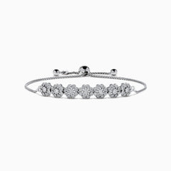 The 925 Sterling Silver Diamond Bouquet Bolo Bracelet features sparkling flower-shaped diamond clusters and an adjustable sliding clasp for a perfect fit.