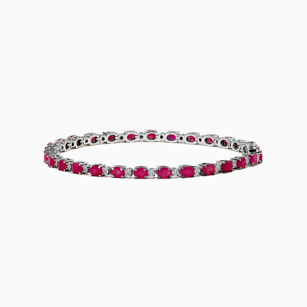 The 925 Sterling Silver Ruby and Diamond Tennis Bracelet features a continuous row of round rubies and diamonds in prong settings, elegantly displayed in a circular shape against a white background.