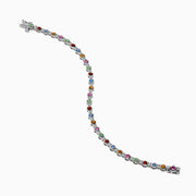 The 925 Sterling Silver Multi Sapphire and Diamond Bezel Bracelet features round, bezel-set multicolored sapphires and diamonds evenly spaced along the band, shown on a white background.