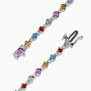 The 925 Sterling Silver Multi Sapphire and Diamond Bezel Bracelet features round, bezel-set multicolored sapphires and diamonds evenly spaced along the band, shown on a white background.