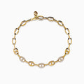 The Doro 14K Yellow Gold Anchor Chain Diamond Bracelet features oval links, some set with sparkling diamonds totaling 0.27 TCW, and is shown on a white background.