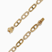 The DOro 14K Yellow Gold Chain Link Diamond Bracelet features oval links with alternating plain and diamond-encrusted segments, totaling 0.94 carat weight.