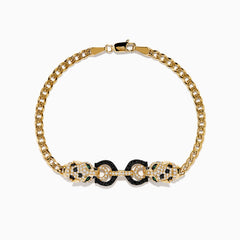 The Signature 14K Yellow Gold Black and White Diamond Panther Bracelet showcases two panther heads with green eyes and diamond accents, joined by black-encrusted circular links.