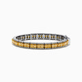 The Canare 14K White and Yellow Gold Yellow and White Diamond Bracelet features a row of yellow diamonds framed by white diamonds, set in elegant white and yellow gold.