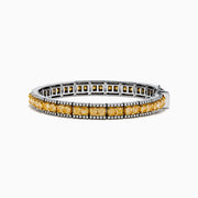 The Canare 14K White and Yellow Gold Yellow and White Diamond Bracelet features a row of yellow diamonds framed by white diamonds, set in elegant white and yellow gold.