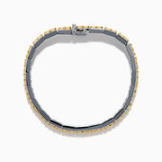 The Canare 14K White and Yellow Gold Yellow and White Diamond Bracelet features a row of yellow diamonds framed by white diamonds, set in elegant white and yellow gold.