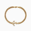 The Mens 14K Yellow Gold Diamond Anchor Chain Bracelet features a bold anchor design encrusted with sparkling diamonds, inspired by classic styles and serving as the central element on a chunky gold chain.
