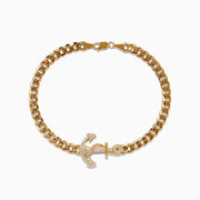 The Mens 14K Yellow Gold Diamond Anchor Chain Bracelet features a bold anchor design encrusted with sparkling diamonds, inspired by classic styles and serving as the central element on a chunky gold chain.