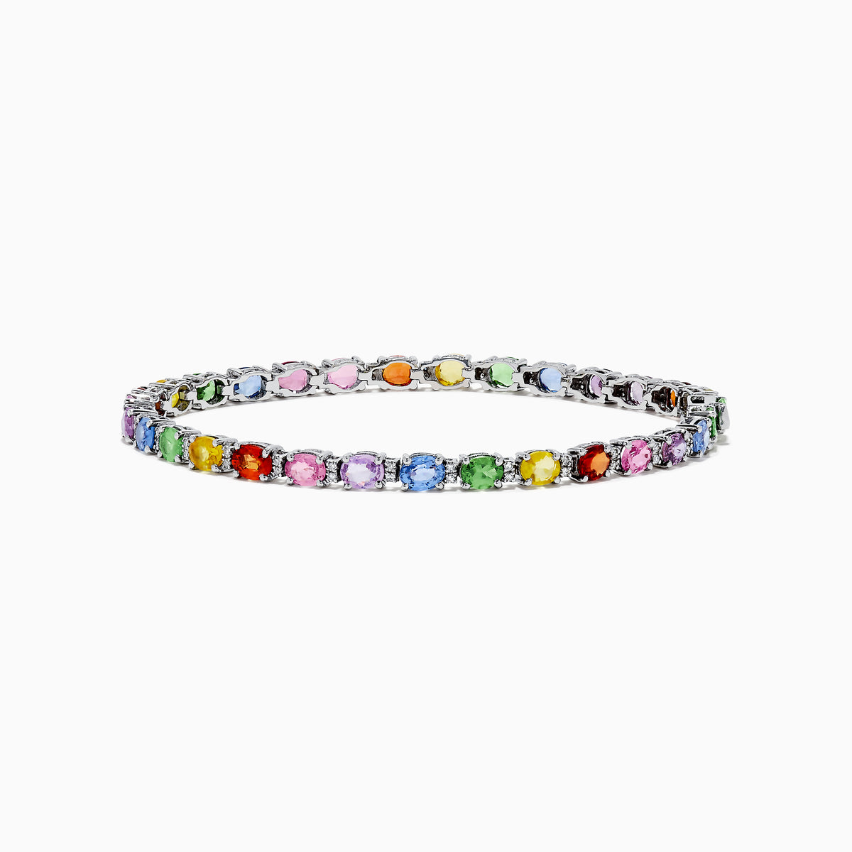 The Watercolors 14K White Gold Multi Sapphire and Diamond Tennis Bracelet features a thin band with colorful round sapphires in pink, blue, green, yellow, and orange set in a repeating pattern.