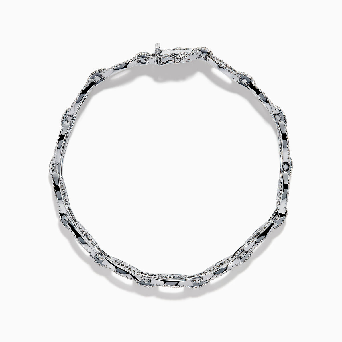 The 14K White Gold Diamond Oval Chain-Link Bracelet showcases a modern and elegant design, featuring alternating smooth and diamond-encrusted oval links, displayed on a white background.