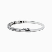 The 925 Sterling Silver Diamond Bangle features two rows of small, round diamonds set along the front, displayed on a white background.