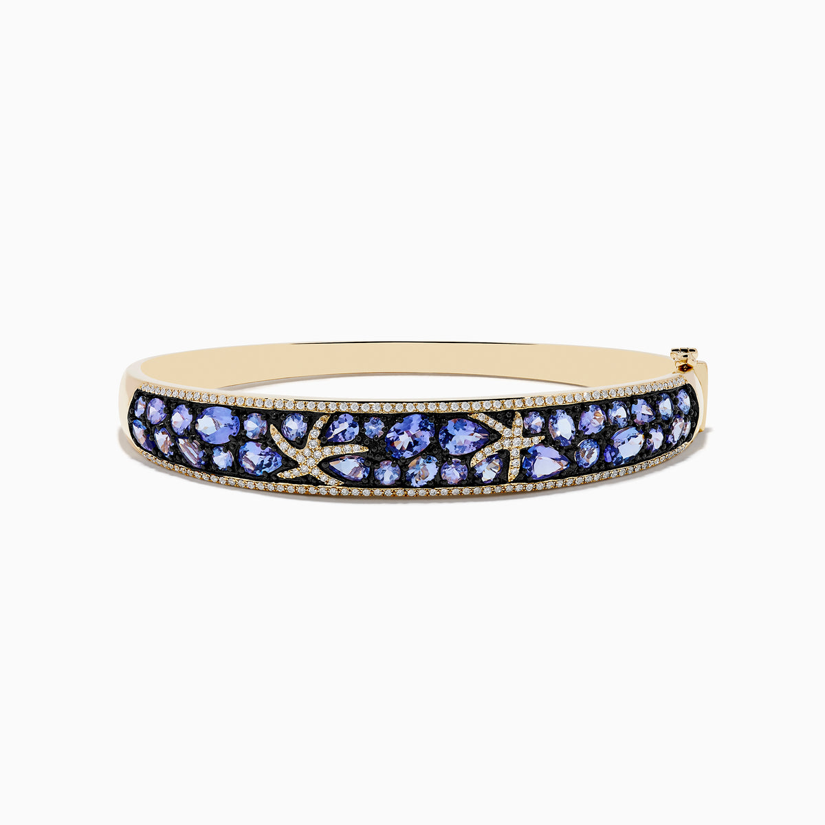 A 14K yellow gold bangle bracelet featuring tanzanite and diamond accents in a starfish design.