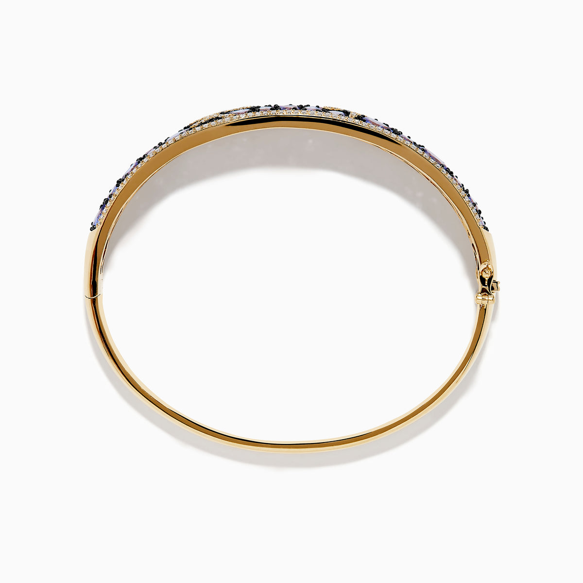 A 14K yellow gold bangle bracelet featuring tanzanite and diamond accents in a starfish design.