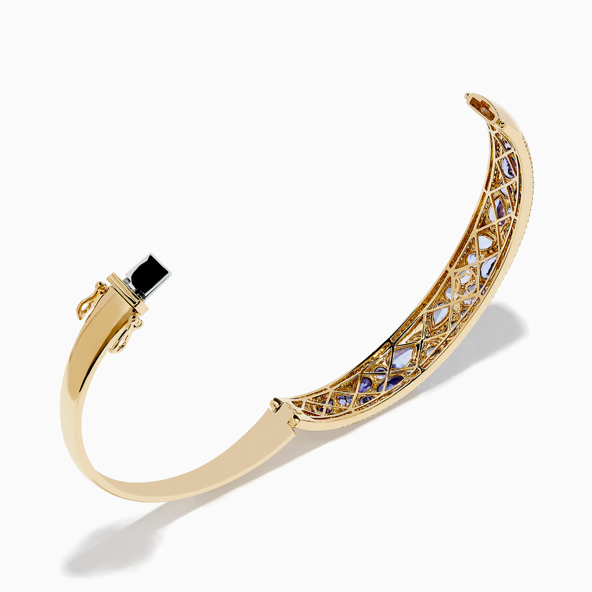 A 14K yellow gold bangle bracelet featuring tanzanite and diamond accents in a starfish design.