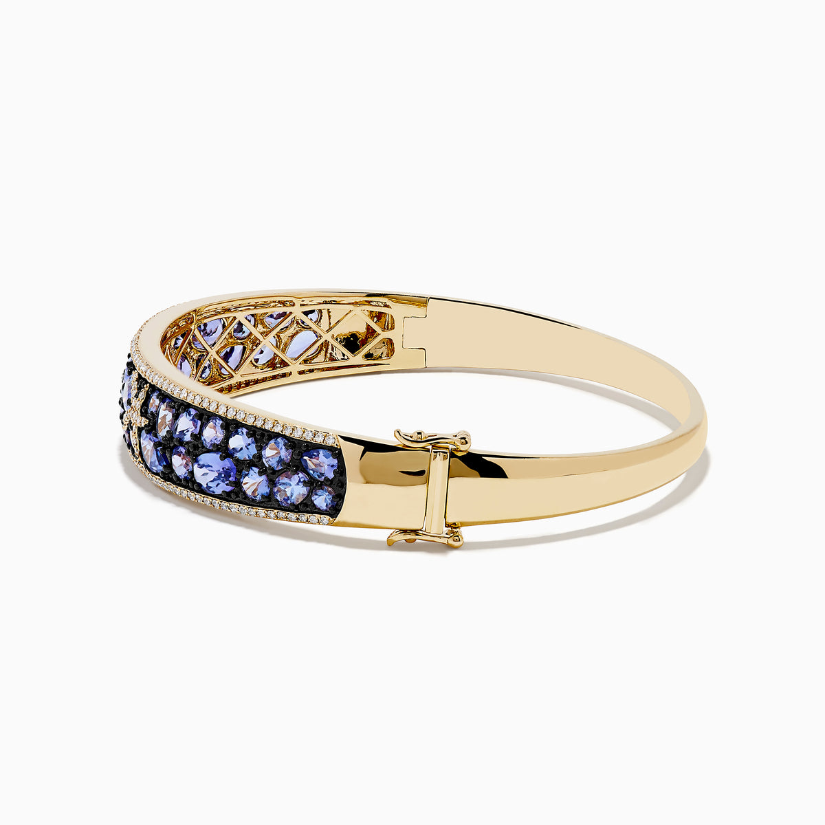A 14K yellow gold bangle bracelet featuring tanzanite and diamond accents in a starfish design.