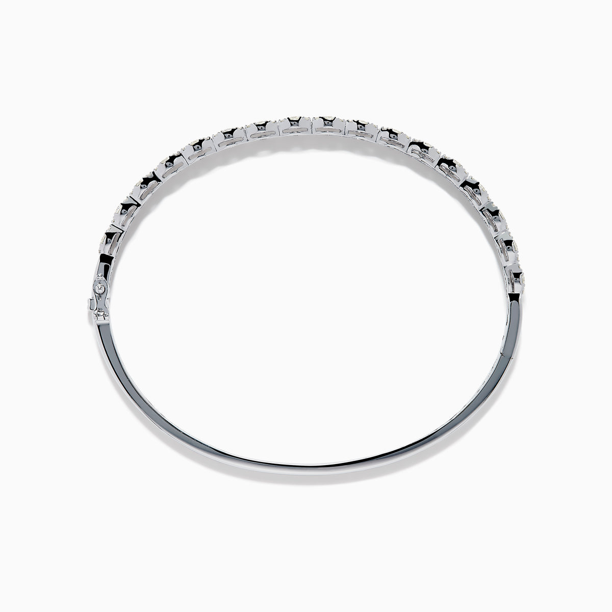The 14K White Gold Diamond Bangle features two rows of diamonds and a delicate openwork pattern on the inner side.