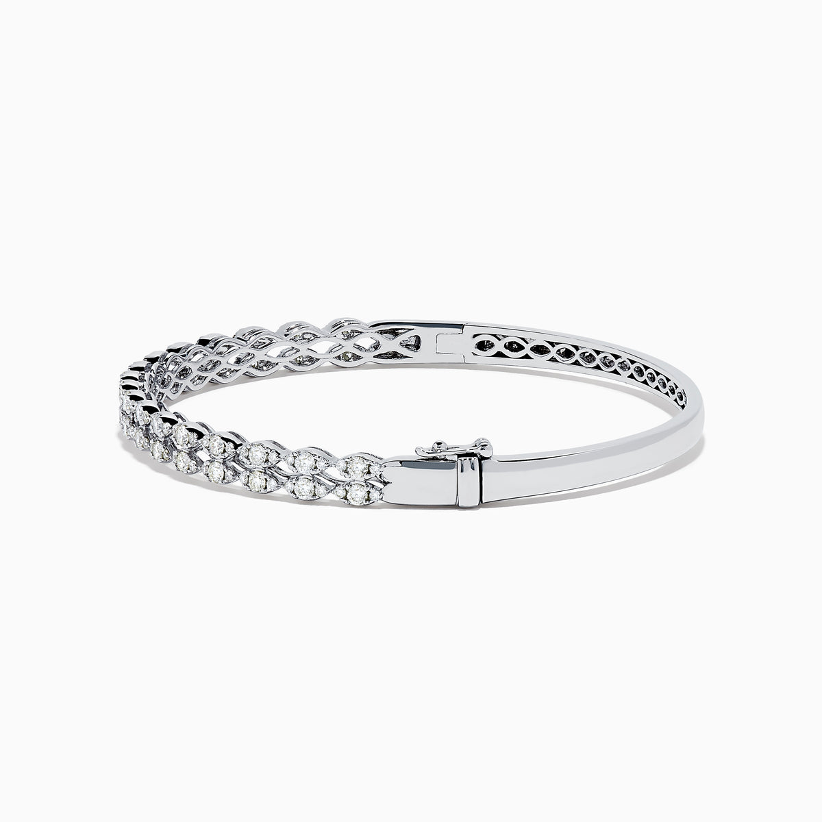 The 14K White Gold Diamond Bangle features two rows of diamonds and a delicate openwork pattern on the inner side.