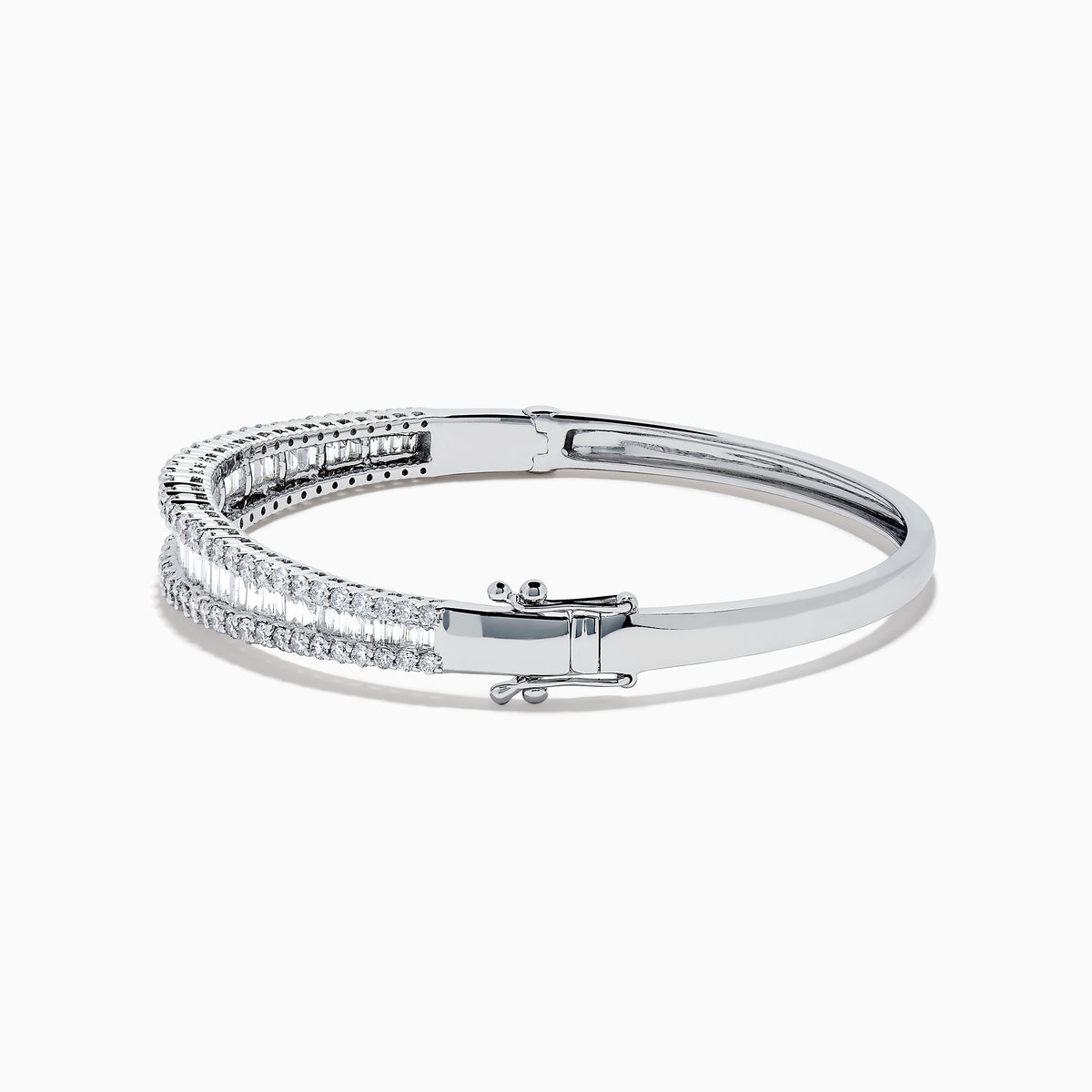The Classique 14K White Gold Diamond Bangle features two rows of round diamonds and a central row of baguette-cut diamonds, elegantly set against a plain white background.