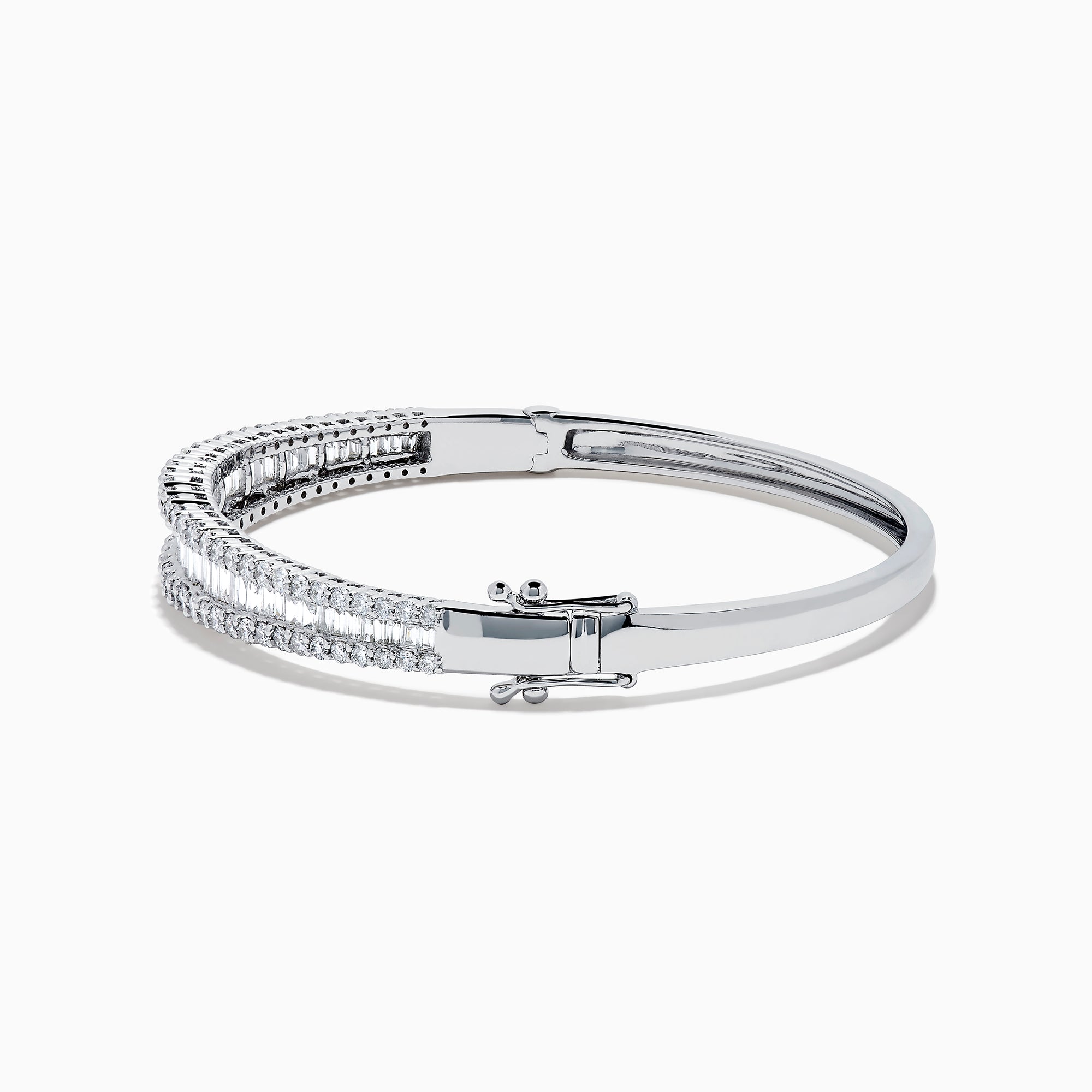 The Classique 14K White Gold Diamond Bangle features two rows of round diamonds and a central row of baguette-cut diamonds, elegantly set against a plain white background.