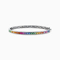 The Watercolors 14K White Gold Multi Sapphire Bangle features a row of square-cut sapphires in a rainbow gradient, set in sleek white gold with a clasp closure.