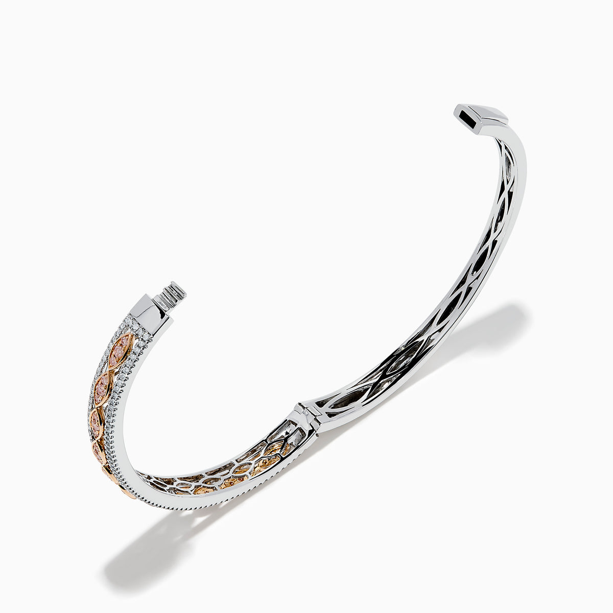 The 14K Two-Tone Gold Pink and White Diamond Bangle features an open cuff with a detailed lattice design and gemstone accents. Shown against a white background, one end appears threaded, indicating it can be screwed closed.