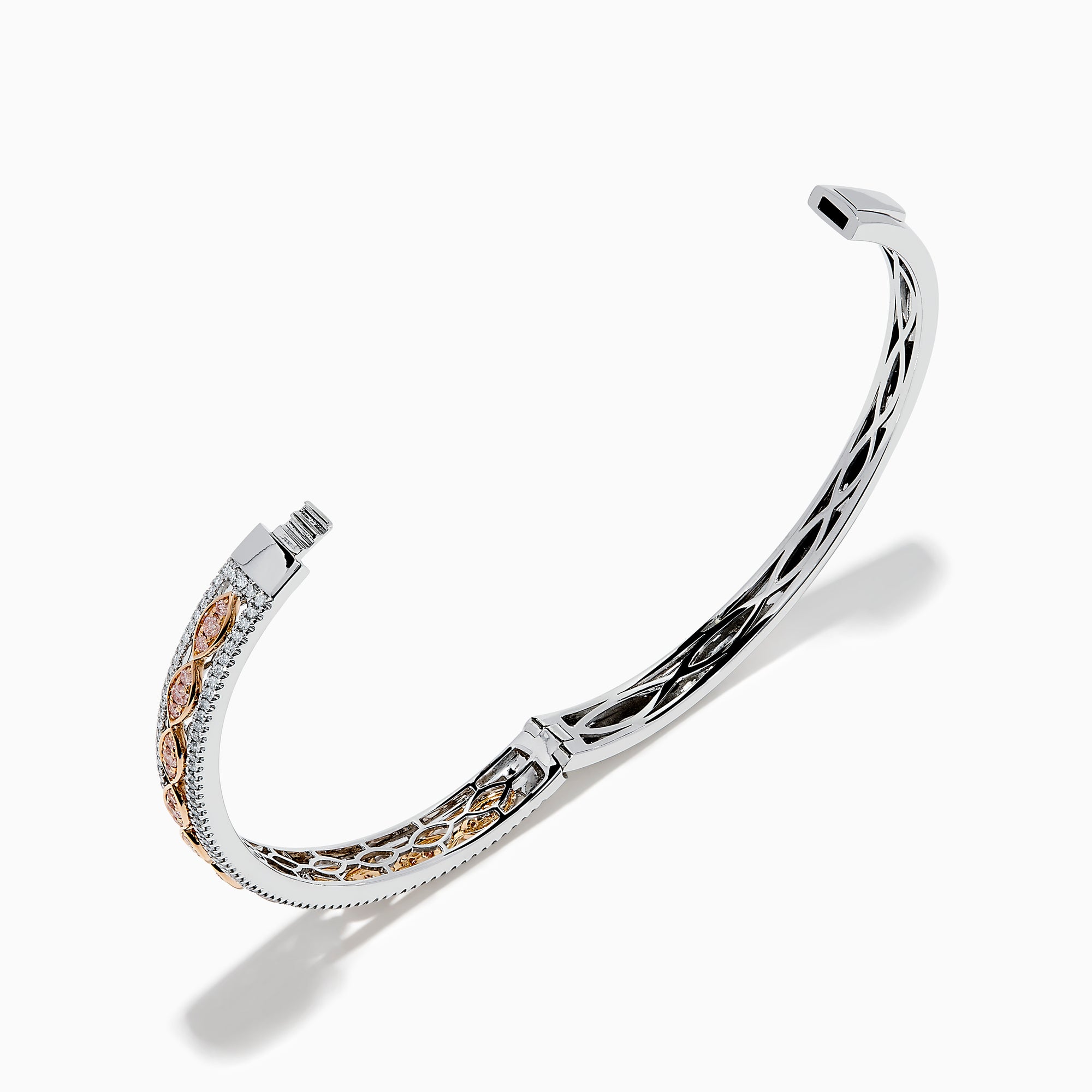 The 14K Two-Tone Gold Pink and White Diamond Bangle features an open cuff with a detailed lattice design and gemstone accents. Shown against a white background, one end appears threaded, indicating it can be screwed closed.