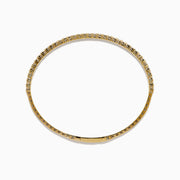 The DOro 14K Yellow Gold Diamond Bangle features a single row of sparkling white diamonds, expertly crafted in radiant yellow gold and elegantly displayed against a white background.