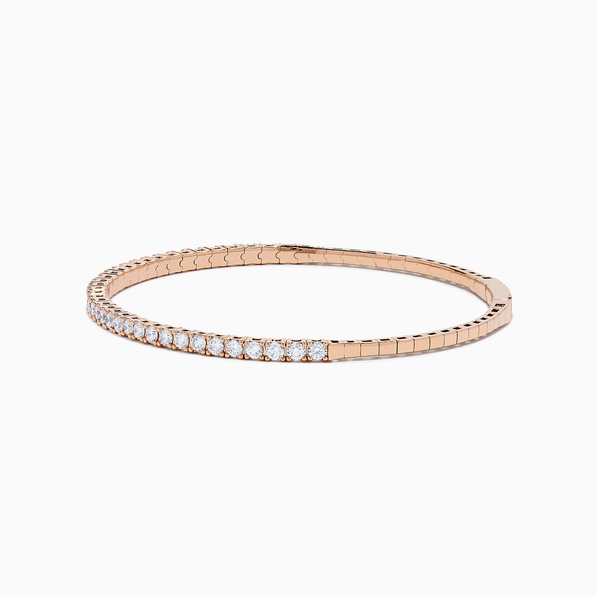 The Pave Rose 14K Rose Gold Diamond Bangle features a slim band adorned with a single row of sparkling white diamonds, set all around its circumference and shown on a white background.