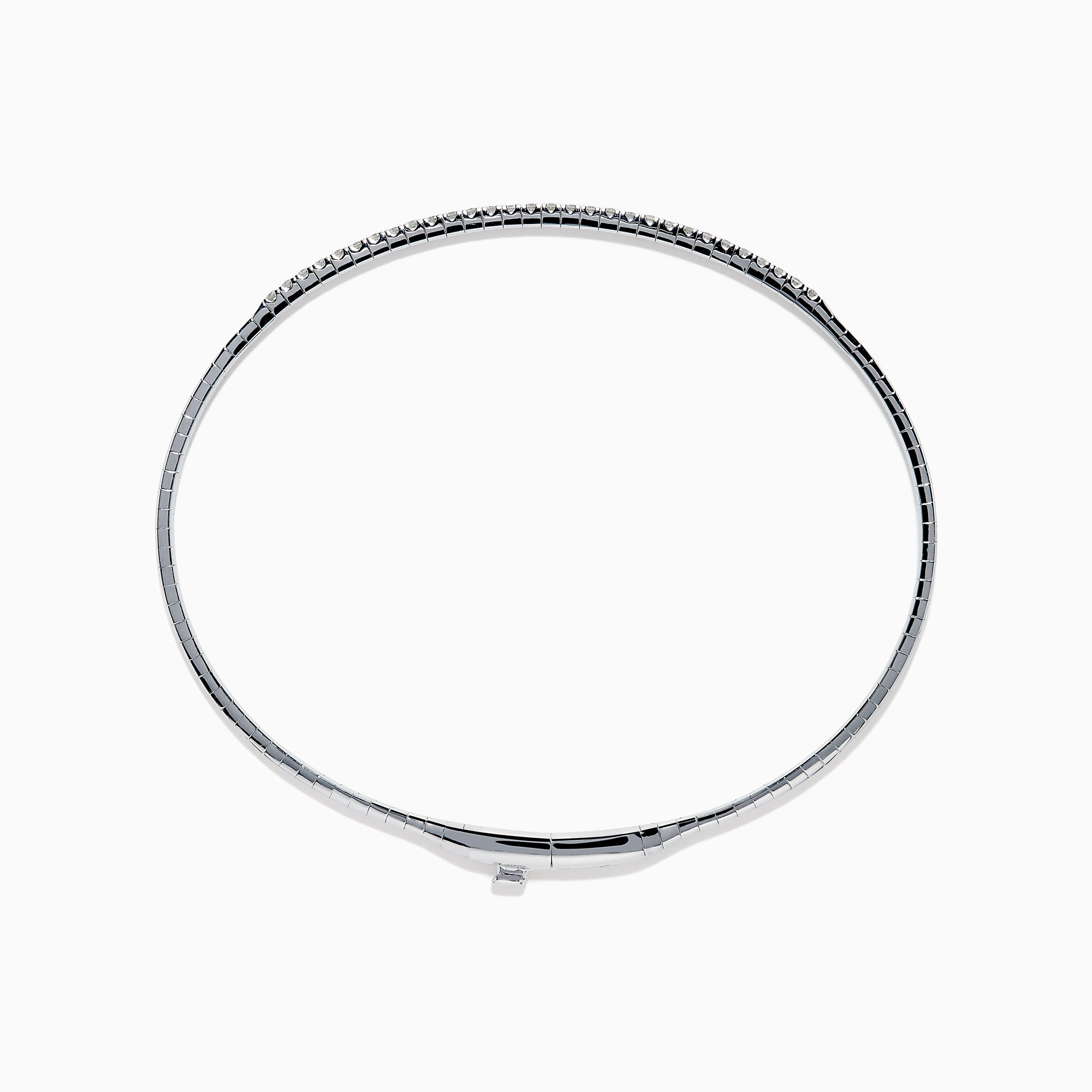 The Classique 14K White Gold Flexible Diamond Bangle features a sleek, minimalist design with a polished finish and a thin row of sparkling diamonds along the top half for effortless elegance.