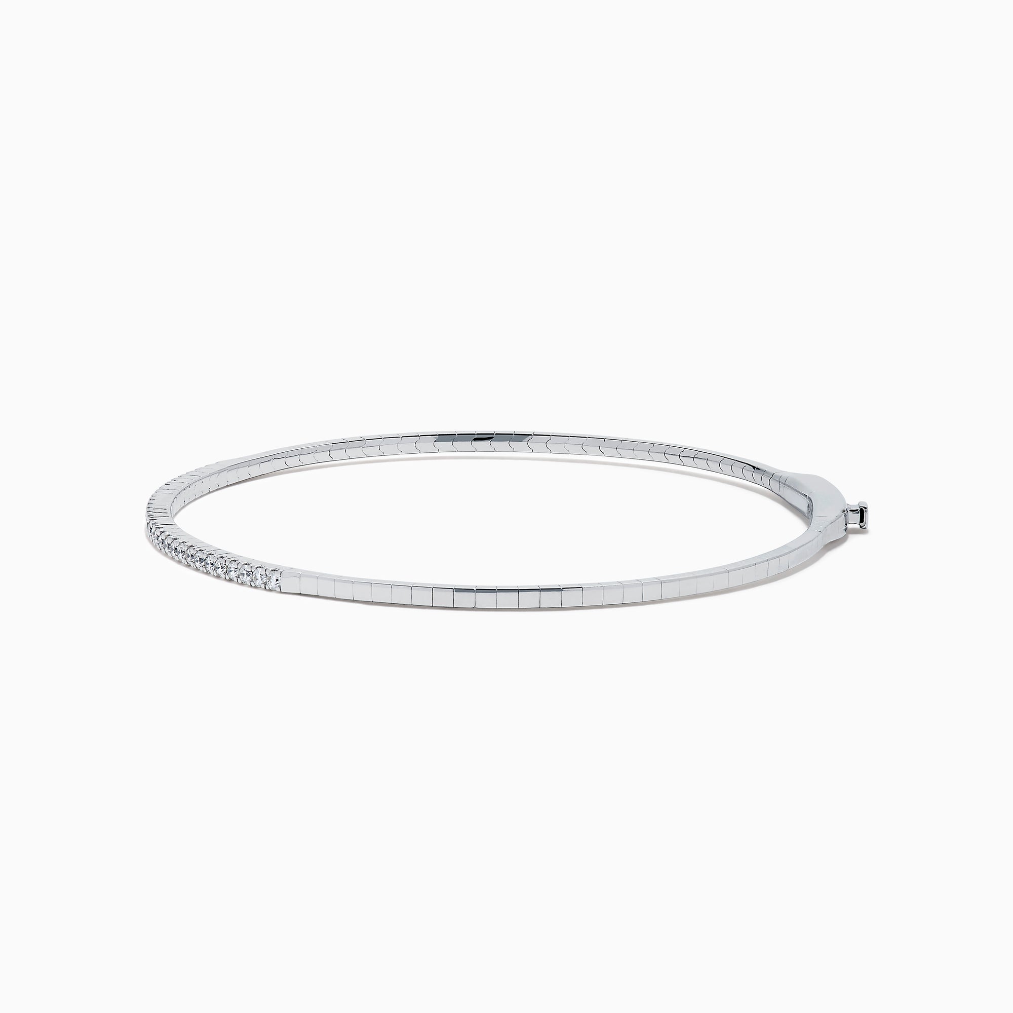 The Classique 14K White Gold Flexible Diamond Bangle features a sleek, minimalist design with a polished finish and a thin row of sparkling diamonds along the top half for effortless elegance.