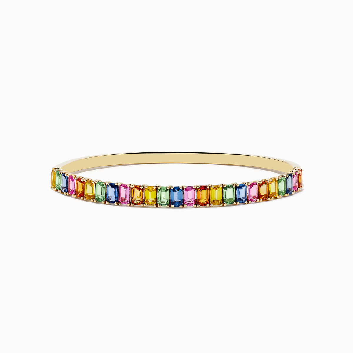 The Watercolor 14k Yellow Gold Emerald Cut Multi Sapphire Bangle features multicolored gemstones in a continuous row, creating a vibrant look.