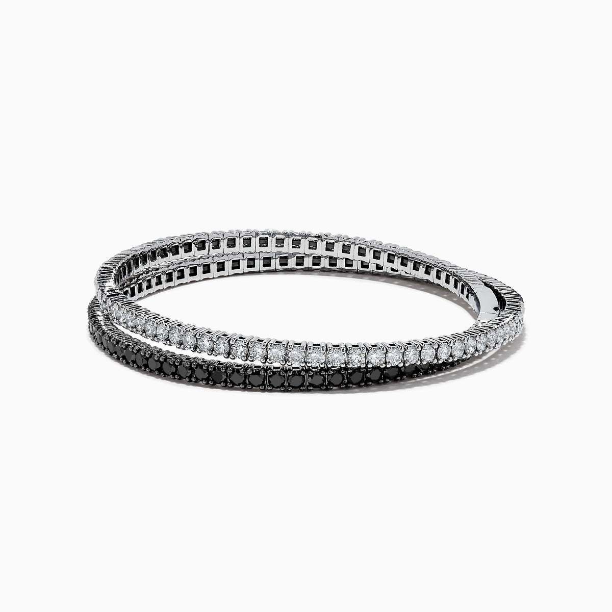 The 14k White Gold Black and White Diamond Double Wrap Bracelet 6.77 TCW features two rows: one with sparkling white diamonds and the other with striking black diamonds, creating a bold yet elegant contrast.