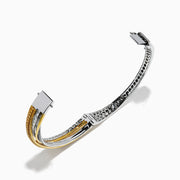 The 14K Two Tone Gold Yellow and White Diamond Pave Crossover Bangle features elegant overlapping rows of yellow and white diamonds in a sparkling, layered design.