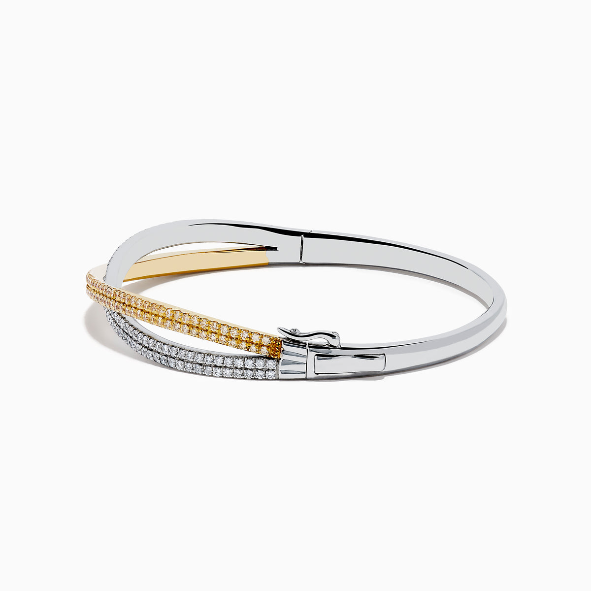 The Canare 14K Two Tone White and Yellow Diamond Criss Cross Bangle features intertwined bands of white and yellow gold, each adorned with sparkling diamonds for a dazzling effect.