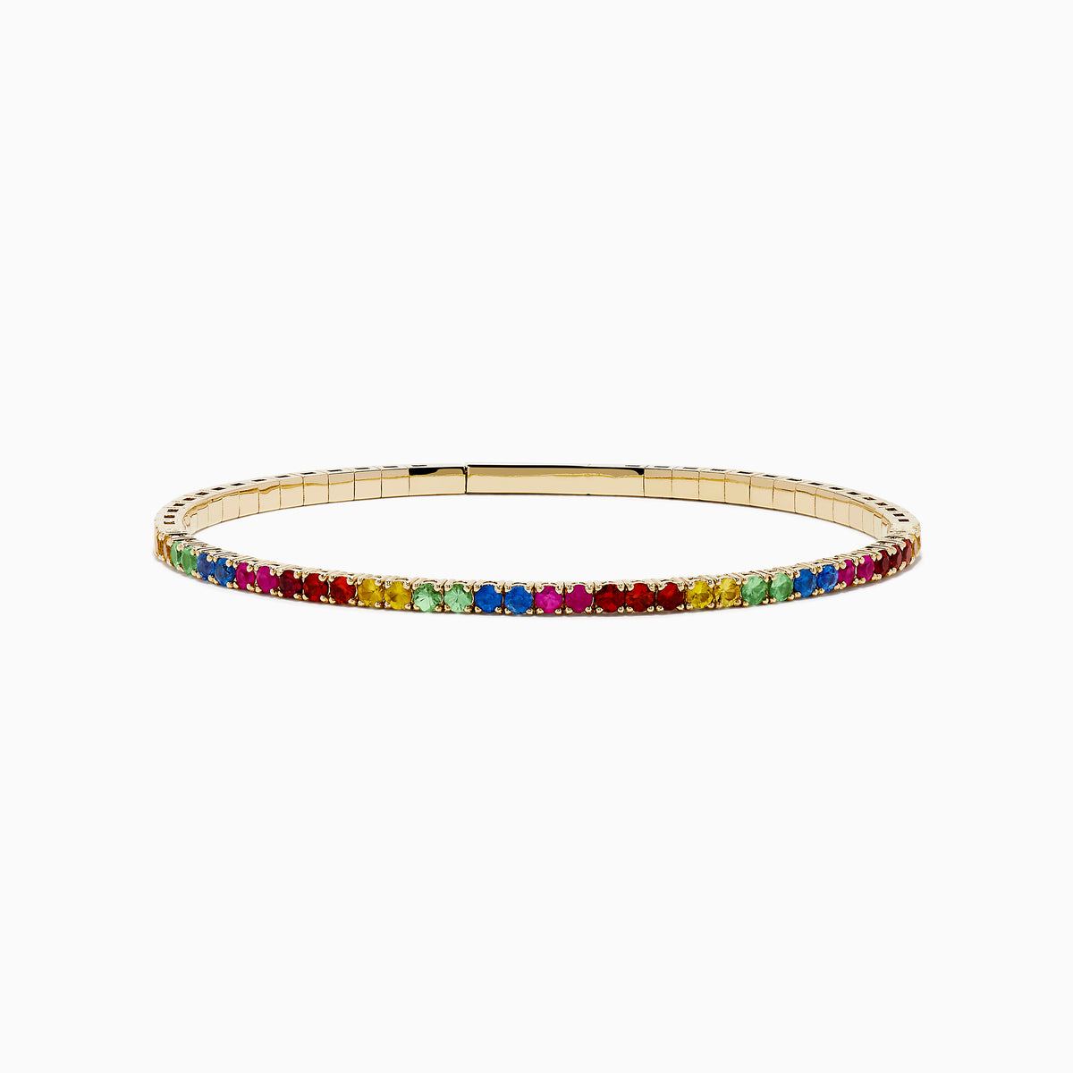 The Watercolors 14K Yellow Gold Multi Sapphire Bangle features a slim yellow gold band adorned with a row of rainbow-hued sapphires along the outer edge, shown on a white background.