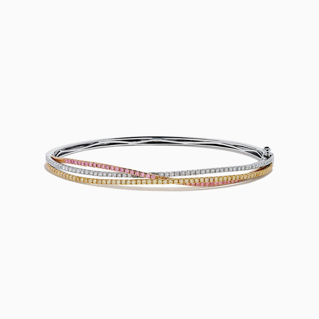 The 18K 3-Tone Gold White, Yellow and Pink Diamond Criss Cross Bangle features three intertwined rows of white, yellow, and pink diamonds set in an elegant, polished design.
