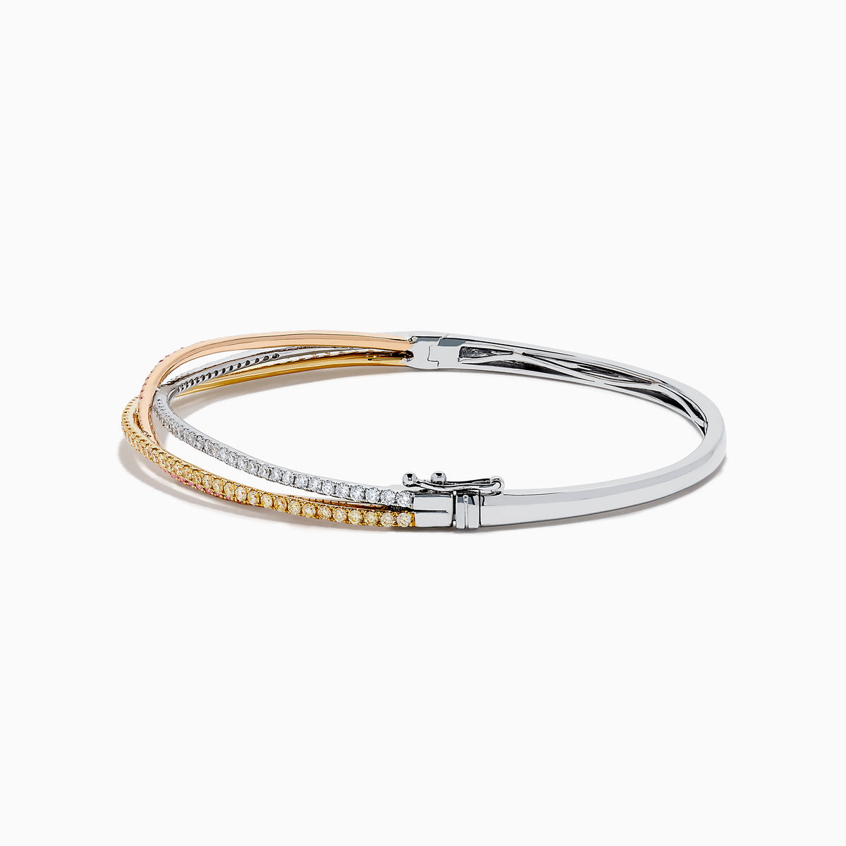The 18K 3-Tone Gold White, Yellow and Pink Diamond Criss Cross Bangle features three intertwined rows of white, yellow, and pink diamonds set in an elegant, polished design.